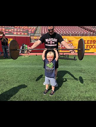 Lawyer Charles D. Slane and a kid lifting